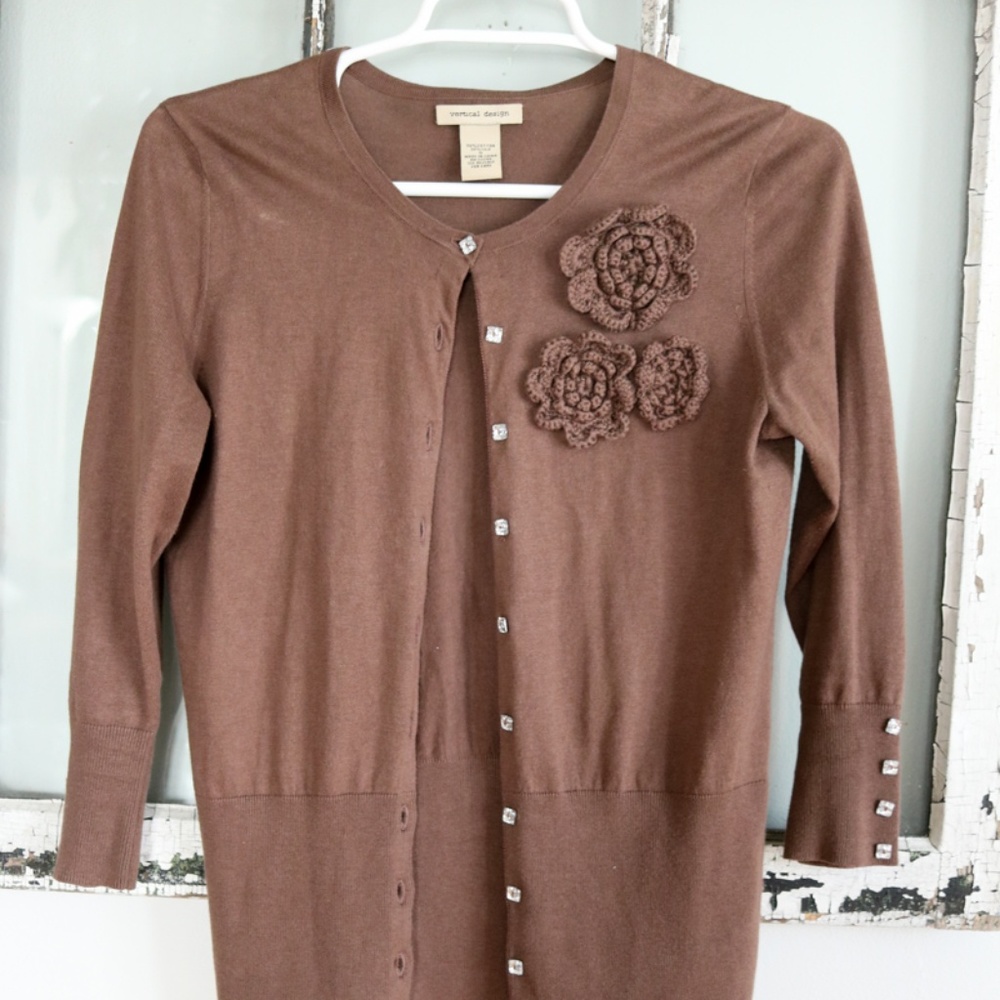 Brown fitted cardigan with crochet flower detail